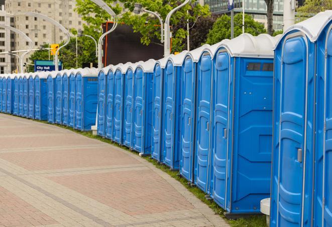 a row of portable restrooms at a fairground, offering visitors a clean and hassle-free experience in Anderson